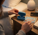 Adult preparing to wear dental night guard before sleep