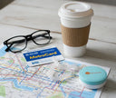 Clear aligners styled with New York MetroCard and city map
