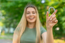 Confident smile maintained with regular retainer wear for overbite correctio