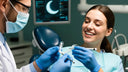 Dentist showing a custom clear night guard to a patient during a consultation