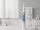 electric toothbrush showing gum-care mode for periodontal health.