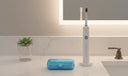 clear aligner case on minimalist bathroom counter