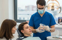 Parent discussing braces cost for child