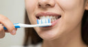 Gentle brushing with toothbrush for sensitive teeth