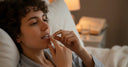 Patient wearing custom night aligners before sleeping