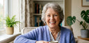 Senior woman wearing a NewSmile clear retainer, showing comfortable and discreet fit