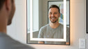 Adult smiling confidently after using retainers for minor crowding correction