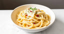 Creamy fettuccine Alfredo — soft pasta dish ideal for aligner wearers.