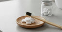 Eco-friendly toothpaste tablets and bamboo toothbrush for sustainable oral care