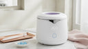 Petal Ultrasonic Cleaner placed on countertop.