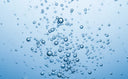 Macro view of cavitation bubbles used in ultrasonic cleaning