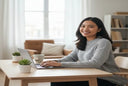 Smiling adult wearing clear aligners at home